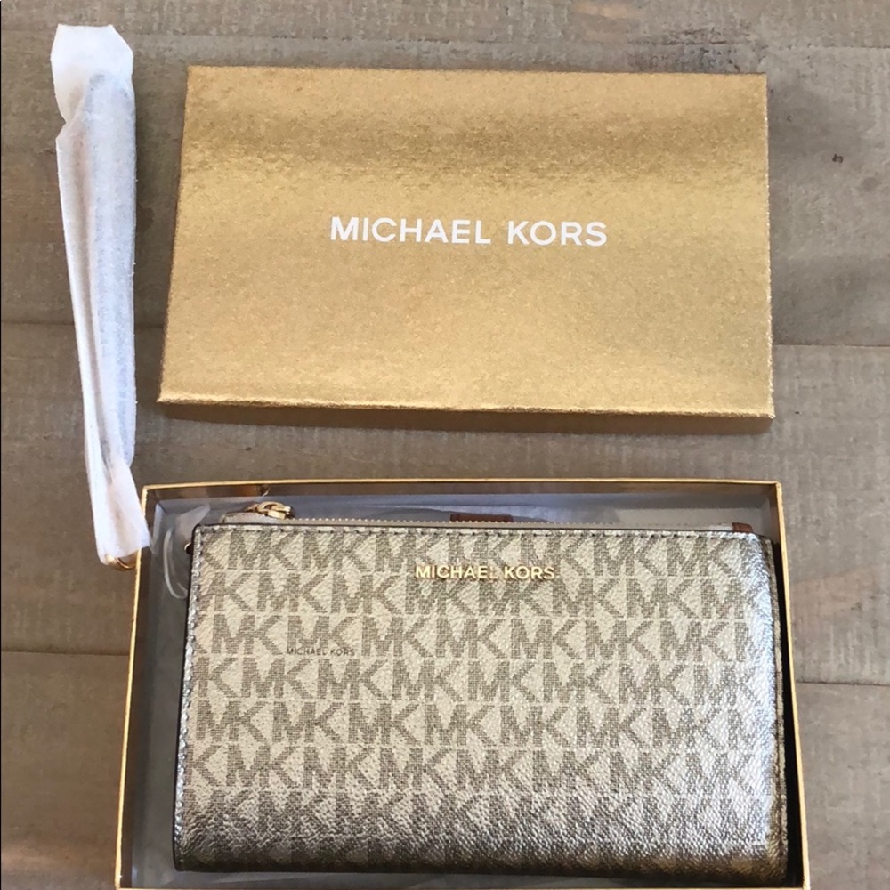 Michael Kors Wristlet New with tags and box